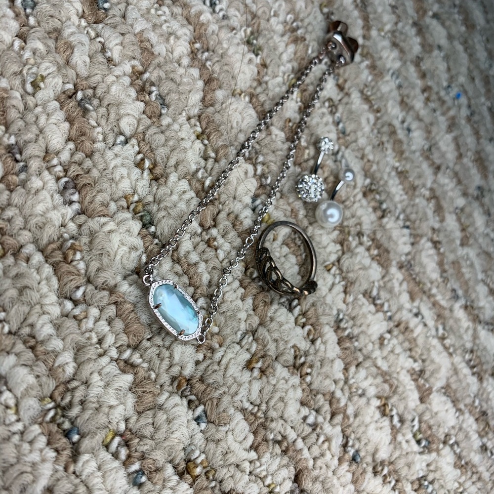Bracelet, ring and two belly piercing rings